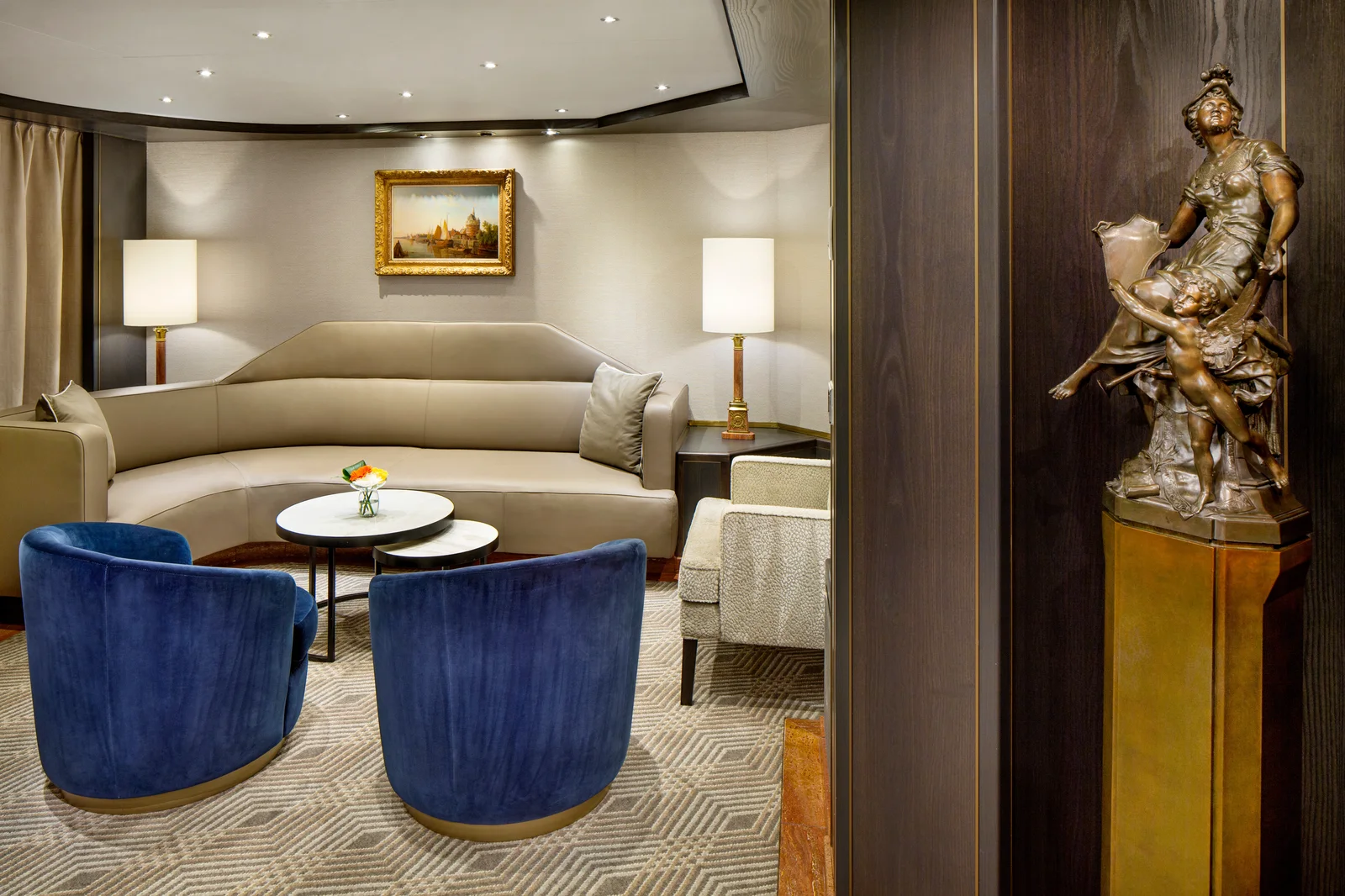 Pinnacle Suite living room on Holland America Rotterdam with original oil painting and elegant furnishings